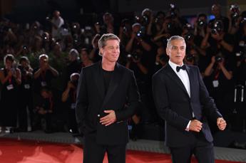 Mostra del cinema, Venezia ai piedi di Brad Pitt e George Clooney